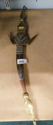 Lot 2025 - A mixed metal wall hanging dagger ornament.