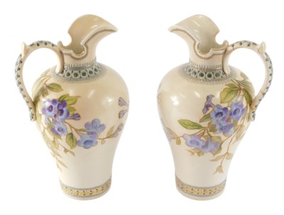 Lot 839 - A pair of Doulton Lambeth ewers, each...