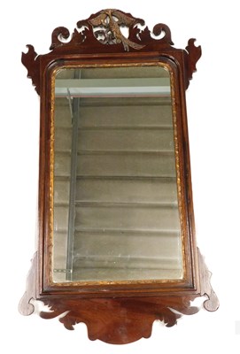 Lot 521 - A George III style fretwork wall mirror...