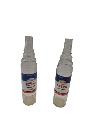 Lot 886 - A pair of Esso extra motor oil quart...