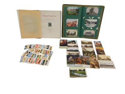 Lot 888 - An album of early 20thC postcards, a copy of...
