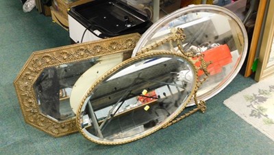 Lot 2141 - A brass repousse framed octagonal hall mirror,...