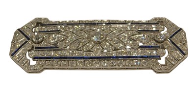 Lot 59 - An Art Deco diamond and sapphire panel brooch,...