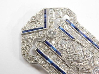 Lot 59 - An Art Deco diamond and sapphire panel brooch,...