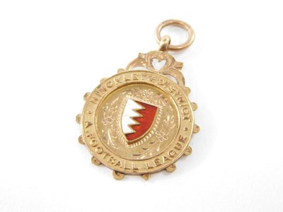Lot 612 - A 9ct rose gold and enamel medallion, for...