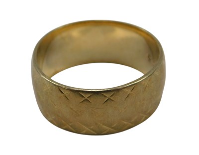 Lot 608 - A 9ct gold wedding band, with engraved plait...