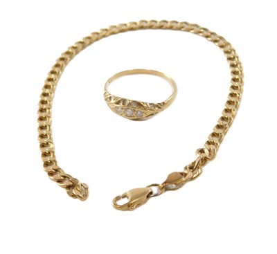 Lot 611 - A curb link bracelet, on a lobster claw...