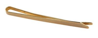 Lot 594 - A 9ct gold tie slide, with engine turned...