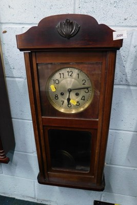 Lot 2200 - An oak cased pendulum wall clock, with...