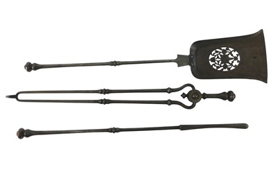 Lot 1004 - A set of three Georgian steel fire irons, with...