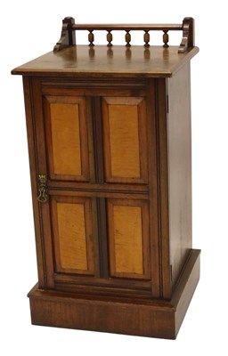 Lot 1052 - A late 19thC walnut and maple pot cupboard,...