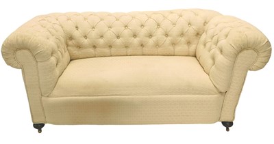 Lot 1068 - A late 19th/early 20thC drop arm Chesterfield...