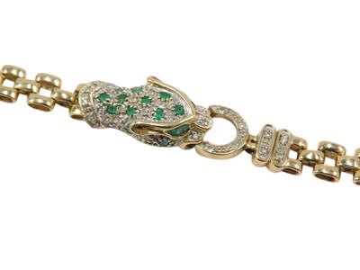 Lot 678 - A 9ct gold emerald and diamond leopard's head...