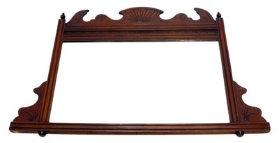 Lot 1081 - An Edwardian walnut overmantel mirror, with...