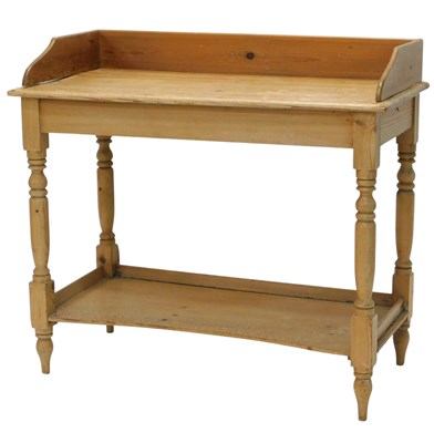 Lot 1085 - A pine wash stand, with a raised back on...