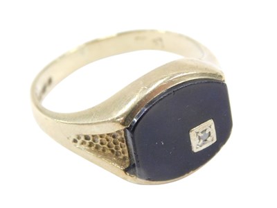 Lot 627 - A 9ct gold black onyx and diamond set...