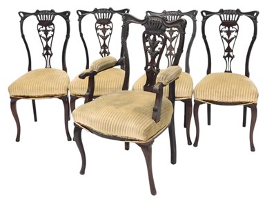 Lot 1094 - An Edwardian mahogany and part salon suite,...