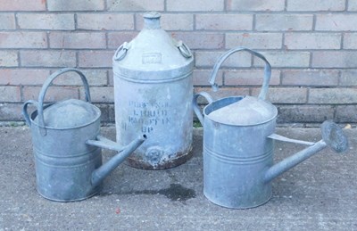 Lot 1208 - Two galvanised metal watering cans, one with...