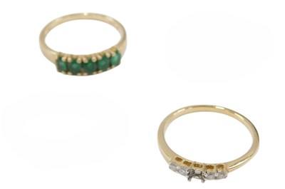 Lot 655 - A 9ct gold and diamond five stone ring, centre...