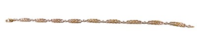 Lot 87 - A 9ct bicolour gold and diamond set Celtic...