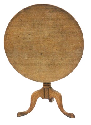 Lot 1102 - A 19thC oak tilt top occasional table, with a...