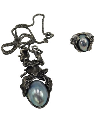 Lot 638 - A silver and Osmena blue maybe pearl necklace...