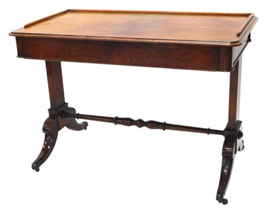 Lot 1109 - A Victorian walnut writing table, the...