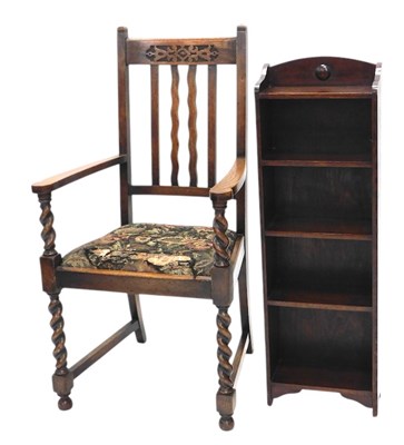 Lot 1124 - A small 1920s oak open bookcase, 33cm...