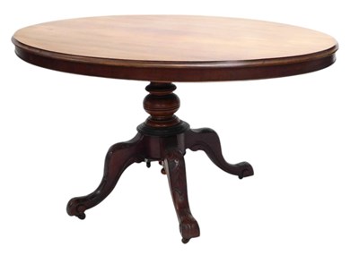 Lot 1134 - A Victorian walnut oval breakfast table, with...