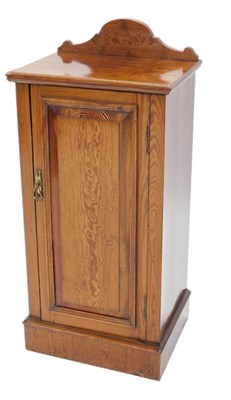 Lot 1152 - A Victorian pitch pine pot cupboard, with a...