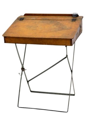 Lot 1164 - A child's plywood desk, with metal...