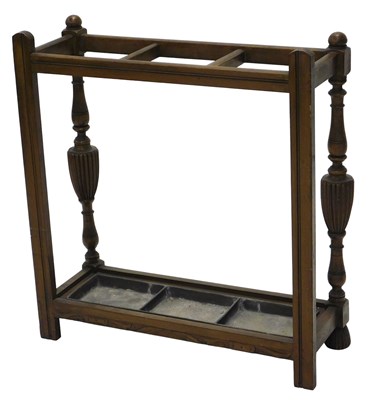 Lot 1175 - A late 19th/early 20thC walnut umbrella stand,...