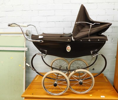 Lot 1514a - A coach built child's pram, in brown.