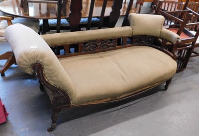 Lot 1555 - A late Victorian walnut chaise longue,...