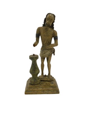 Lot 894 - A German carved wooden figure of Christ beside...