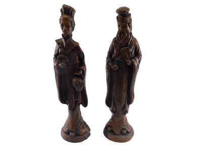 Lot 1041 - A pair of resin figures, in Oriental style.