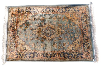 Lot 1087 - A modern cotton machine woven rug, in Persian...