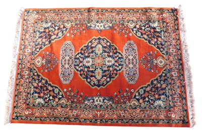 Lot 1089 - A machine woven Turkish rug, label stating...