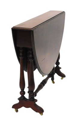 Lot 1121 - A late Victorian walnut oval drop leaf...