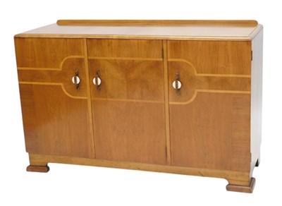 Lot 1169 - An Art Deco walnut sideboard, with a raised...