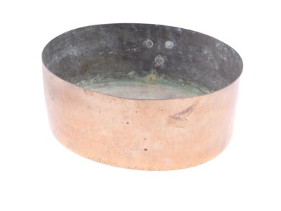Lot 983 - An oval copper jardiniere or pan, 30cm diameter.