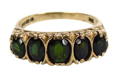 Lot 581 - A 9ct gold and demantoid garnet five stone...