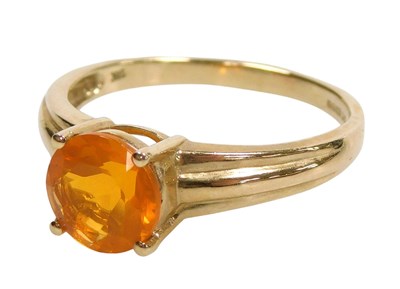 Lot 577 - A 9ct gold and fire opal solitaire ring, claw...