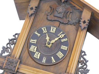 Lot 787 - A late 19th/early 20thC black cuckoo clock,...
