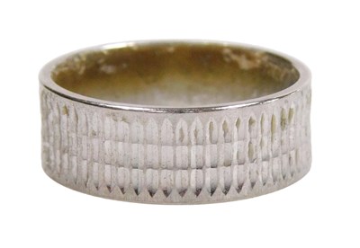 Lot 148 - A wedding band, with engraved decoration,...