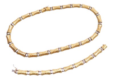 Lot 18 - A bi-colour textured link necklace, and...