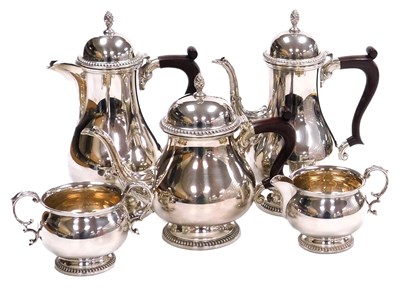 Lot 7 - An Elizabeth II silver five piece tea and...