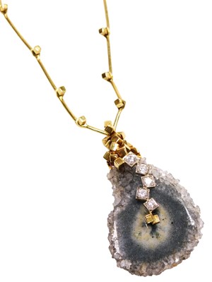 Lot 19 - An 18ct gold sliced agate and diamond pendant...