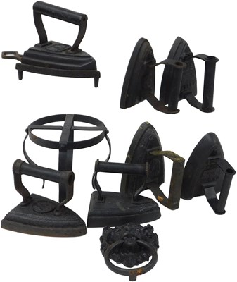 Lot 35 - Seven Victorian cast flat irons, together with...