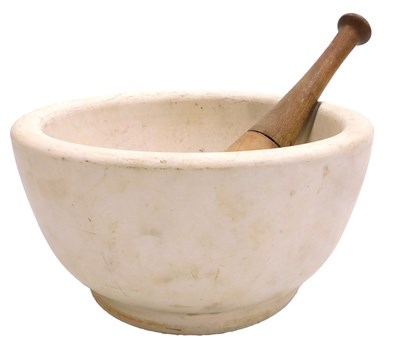 Lot 61 - A stone pestle and mortar, the pestle with a...